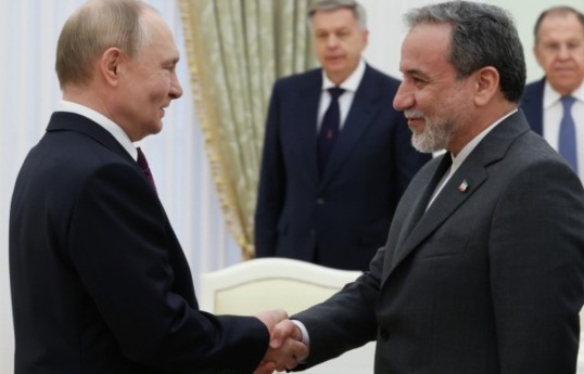 Russian President Vladimir Putin, Iran’s Foreign Minister Abbas Araghchi