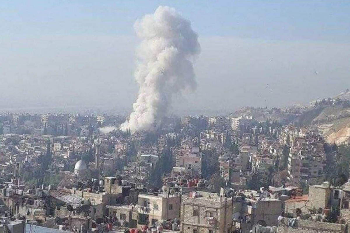 Explosion in Damascus suburb kills two, injures 13