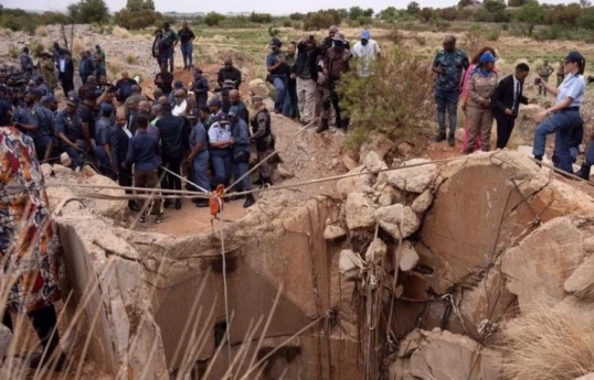 14 illegal miners dead, scores injured at disused South Africa mine, police say