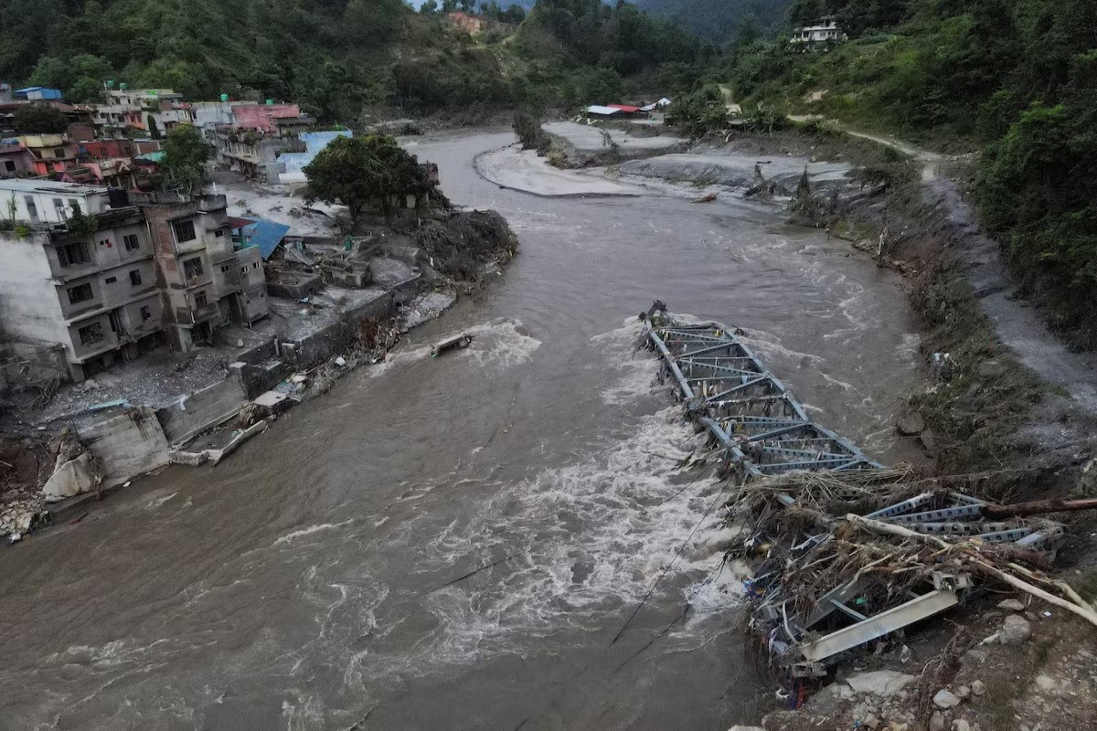 Nepal and China resume flood rescue after lake threat eases, death toll nears 600