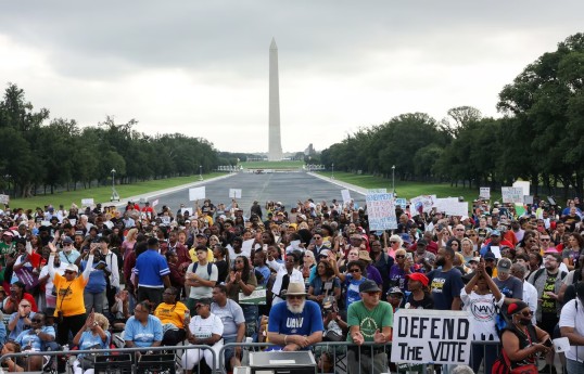 Thousands march in Washington as leaders warn of voting and civil rights rollbacks
