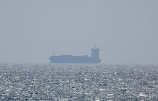 UK says ship hit by projectile off Oman