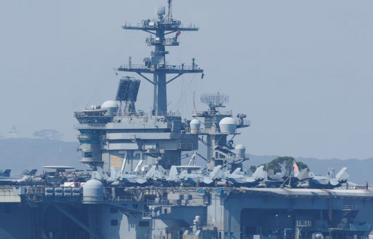 US shoots down Iranian drone approaching aircraft carrier, official says