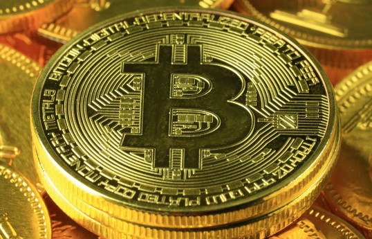 Bitcoin on the cusp of $60,000 as investors flee risky bets