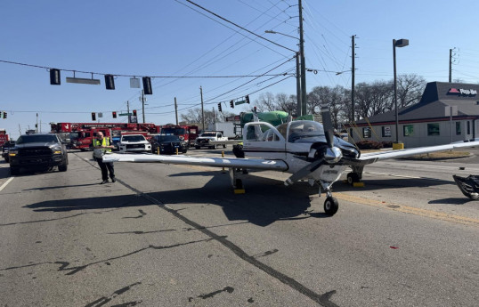 Small plane crashes into vehicles after emergency landing in Georgia State