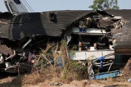 At least 32 killed after crane falls on train in Thailand