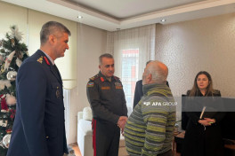 Azerbaijani military attaché visits family of soldier martyred in plane crash