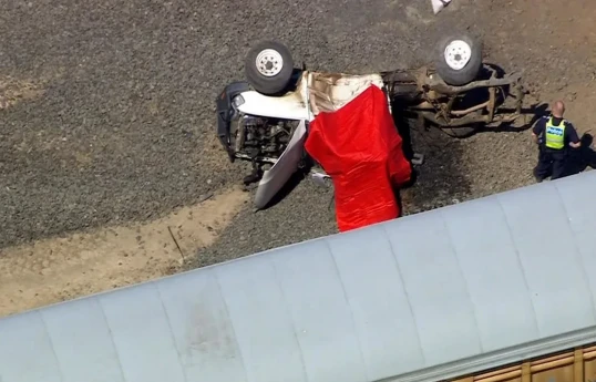 2 killed in collision between car, train west of Melbourne