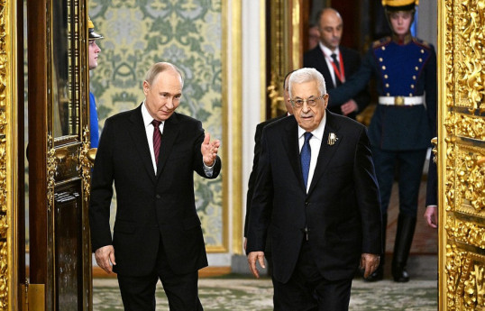 Russian President Vladimir Putin  and President of the State of Palestine, Mahmoud Abbas