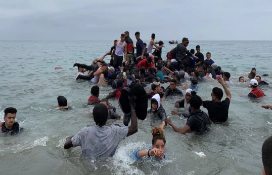 Hundreds of migrants enter Spain's north African territory Ceuta from Morocco