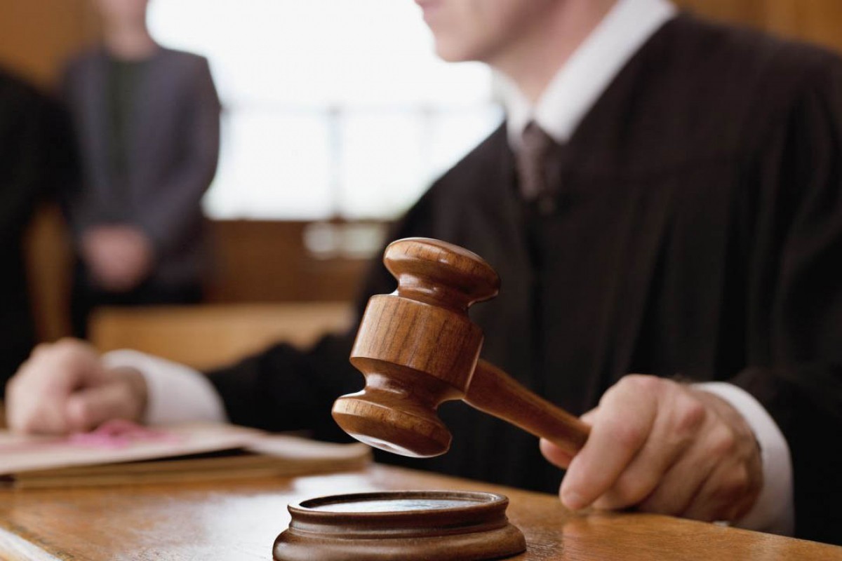 Sentence revised for executive of French company imprisoned 