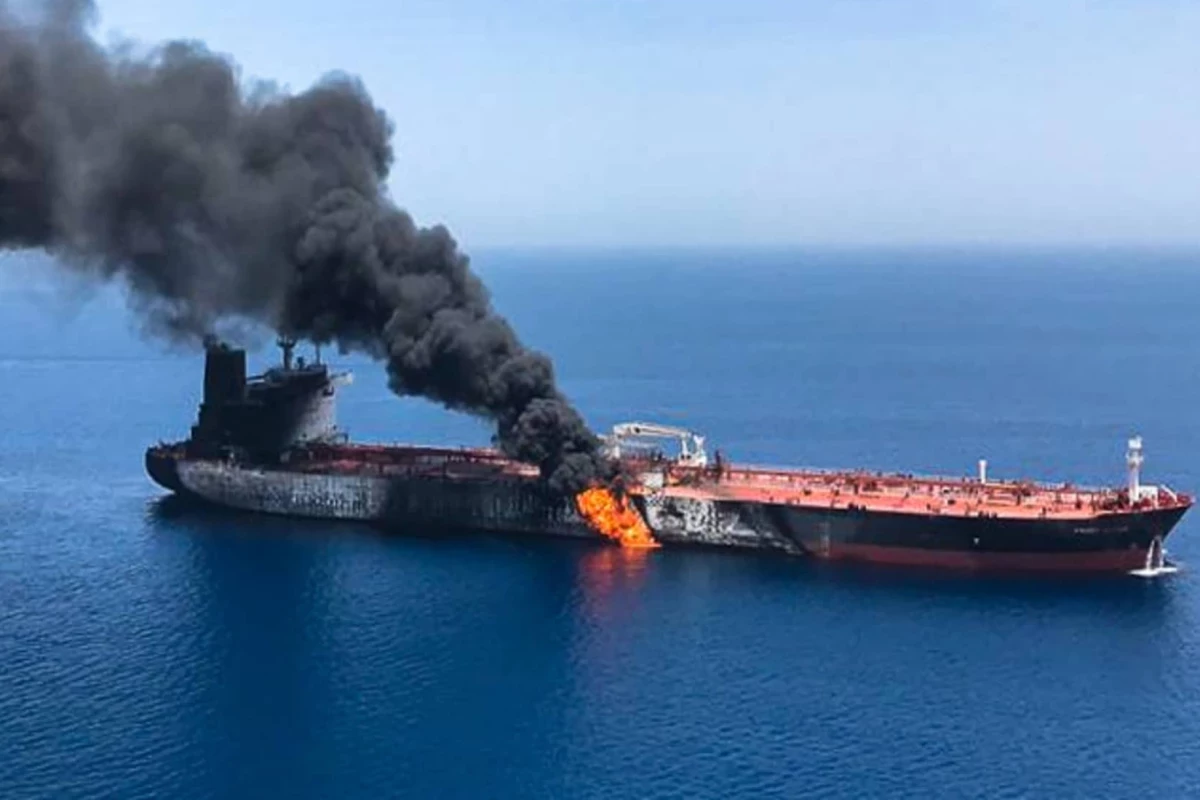 2 crew members missing after fire erupts on tanker off Oman, maritime agency says
