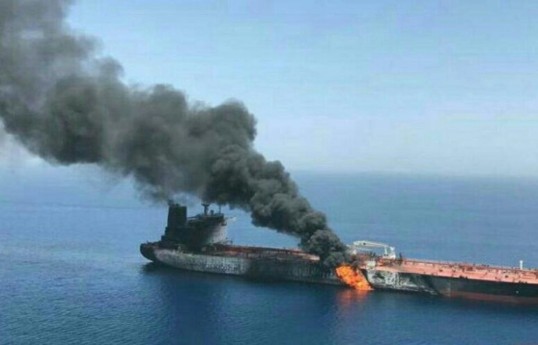 Tanker hit by unidentified projectile in Hormuz, British maritime agency says