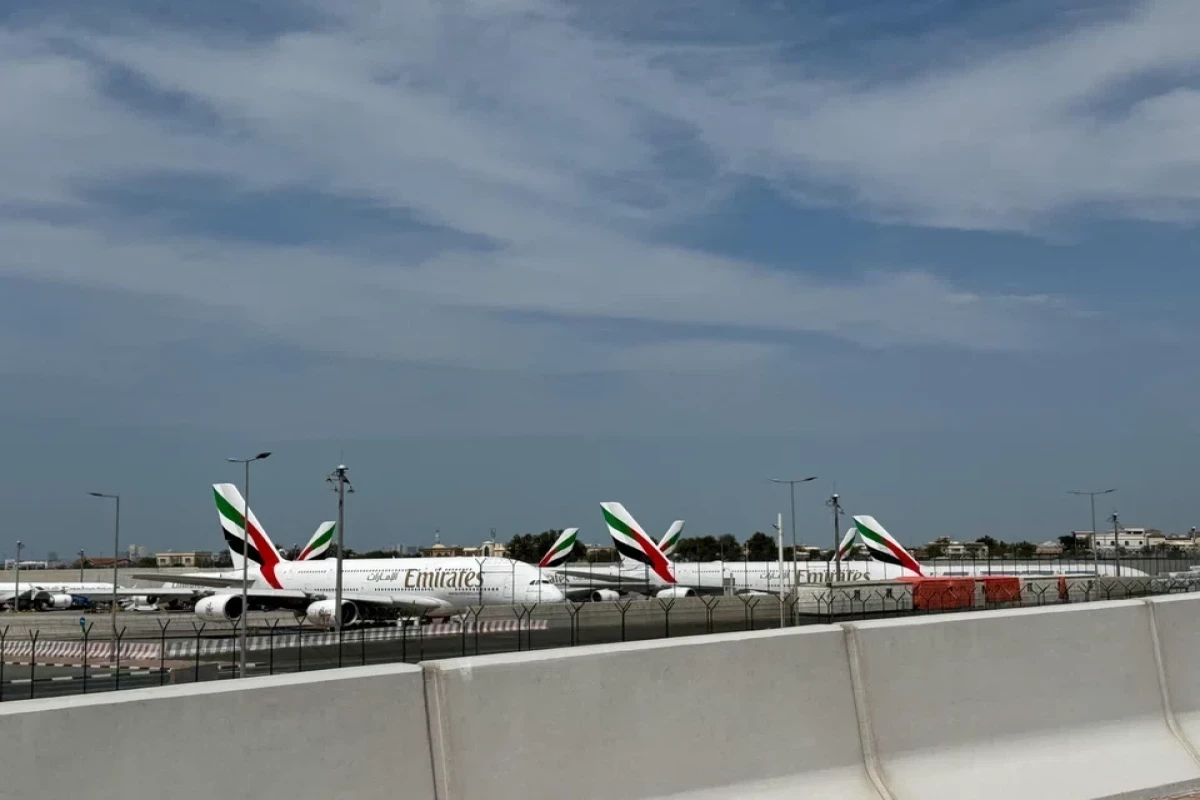 Dubai airport flights temporarily suspended again after drone attack and fire