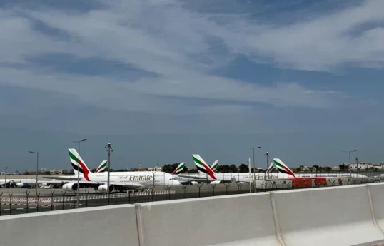Dubai airport flights temporarily suspended again after drone attack and fire