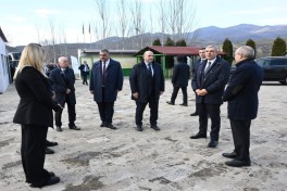 Coordination Headquarters members view sunflower oil plant in Girmizi Bazar settlement