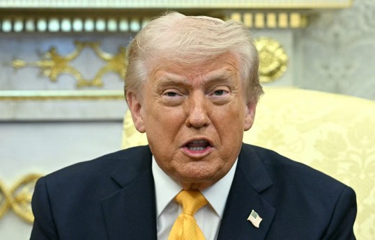 Trump says he's not deploying US troops, but notes he wouldn't say if he were