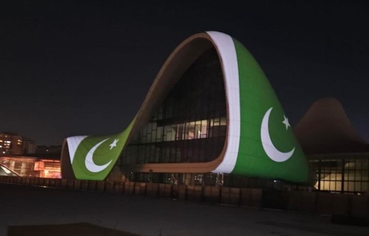 Pakistani flag projected onto Heydar Aliyev Center building