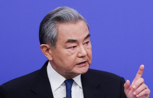 China's foreign minister holds call with Iranian counterpart