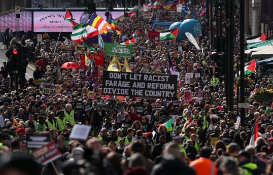 Protesters march in London to oppose the rise of political right