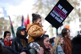 Protesters march in London to oppose the rise of political right