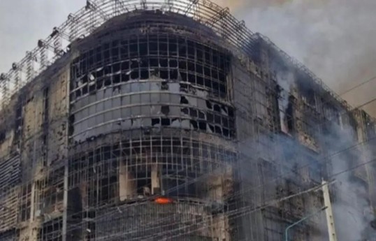 Fire at mall near Tehran kills at least 11, official says