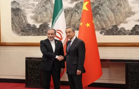 Iranian FM Abbas Aragchi and Chinese Foreign Minister Wang Yi