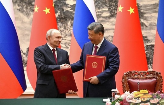 Russian President Vladimir Putin and President of the People's Republic of China Xi Jinping