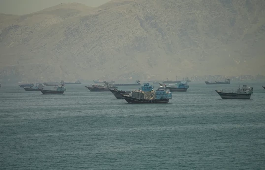 Iran says it fired warning shots at vessels near Strait of Hormuz