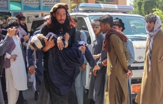 18 dead, 35 injured as truck carrying Afghan returnees overturns