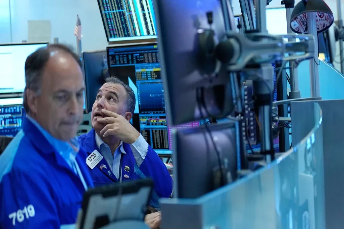 U.S. stocks close mixed despite cooler inflation report