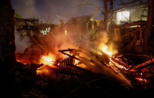 Russian air strikes injure two in Ukraine's Kyiv, Odesa, officials say