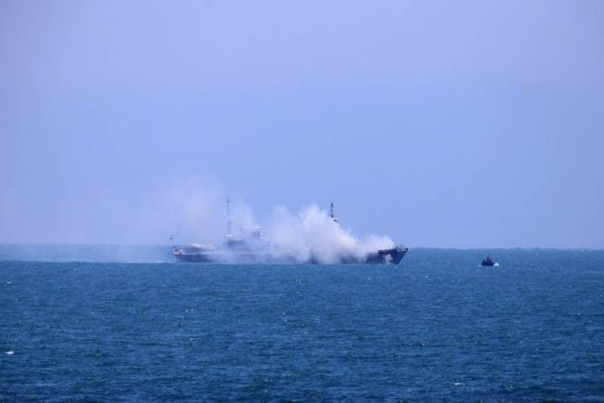 UK says ship struck by projectile in Hormuz