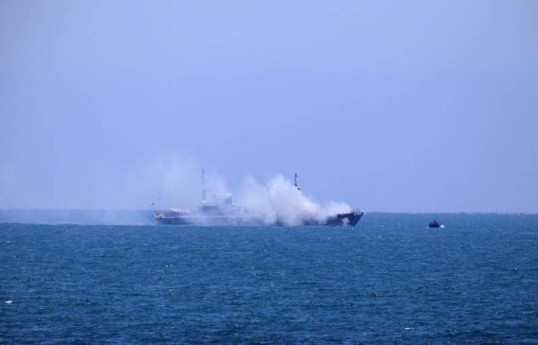UK says ship struck by projectile in Hormuz