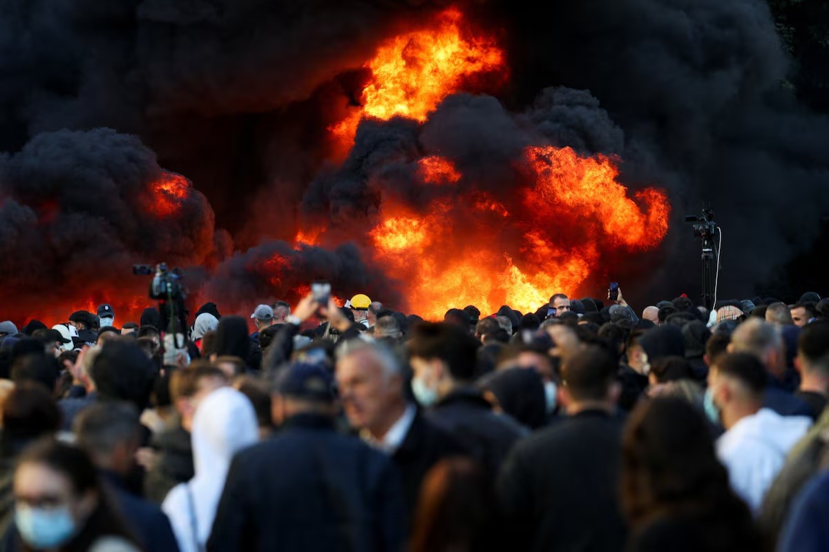Banks, buildings burn as Albania