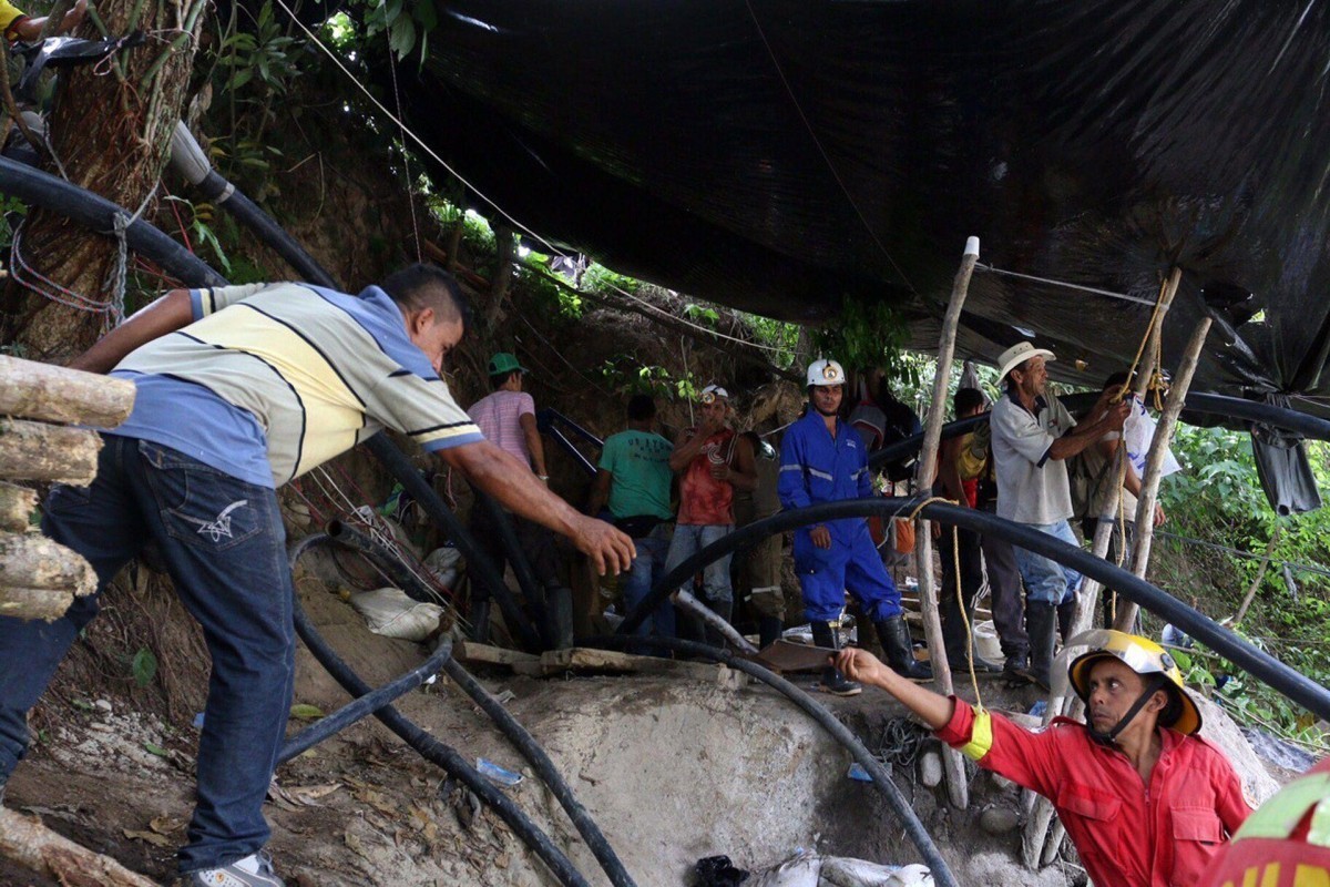 Death toll from Colombia gold mine collapse rises to 14