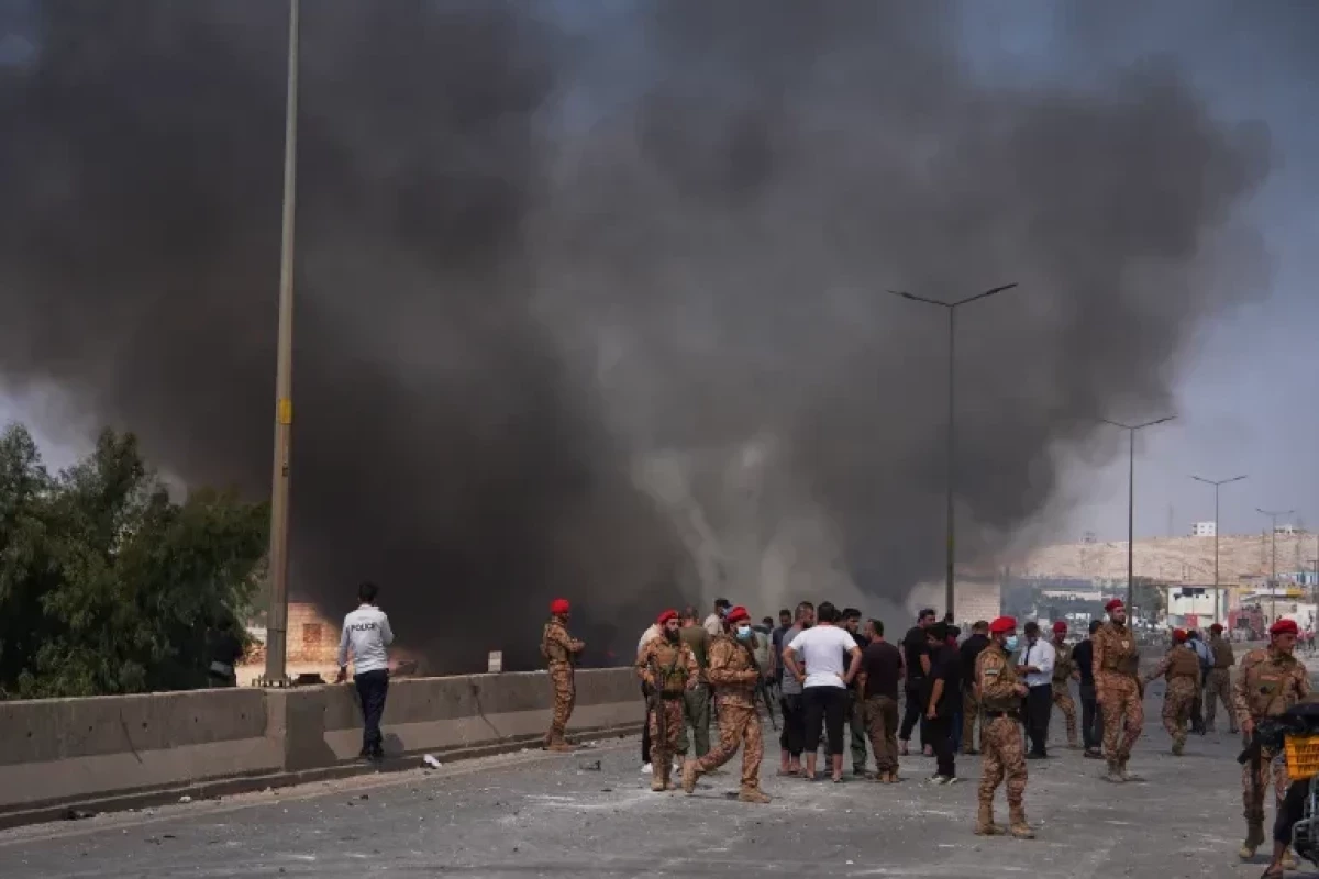 At least 14 killed in explosion at weapons depot in Syria