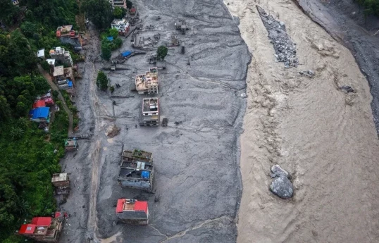 Death toll from Nepal floods rises to 1,403