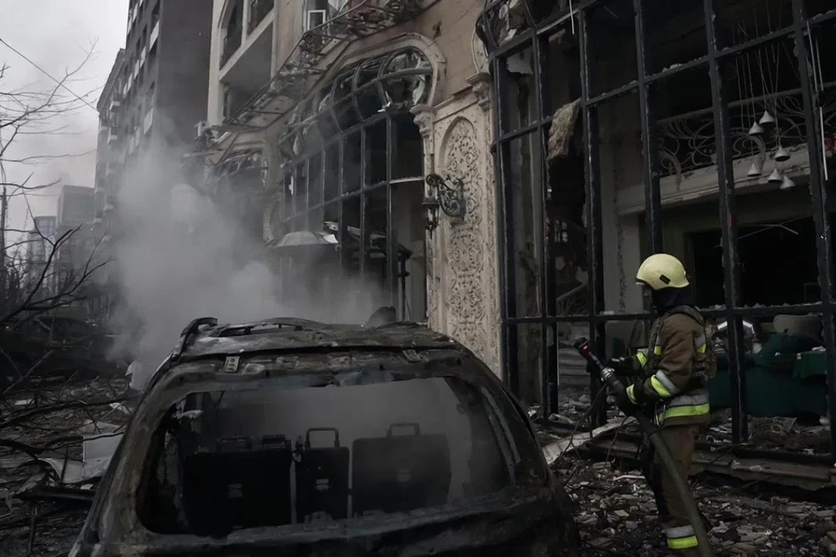 Russian ballistic missile attack against Kyiv kills 2, injures 8 after day of drone strikes