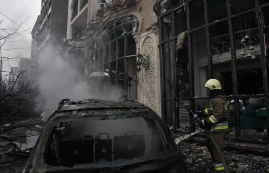 Russian ballistic missile attack against Kyiv kills 2, injures 8 after day of drone strikes